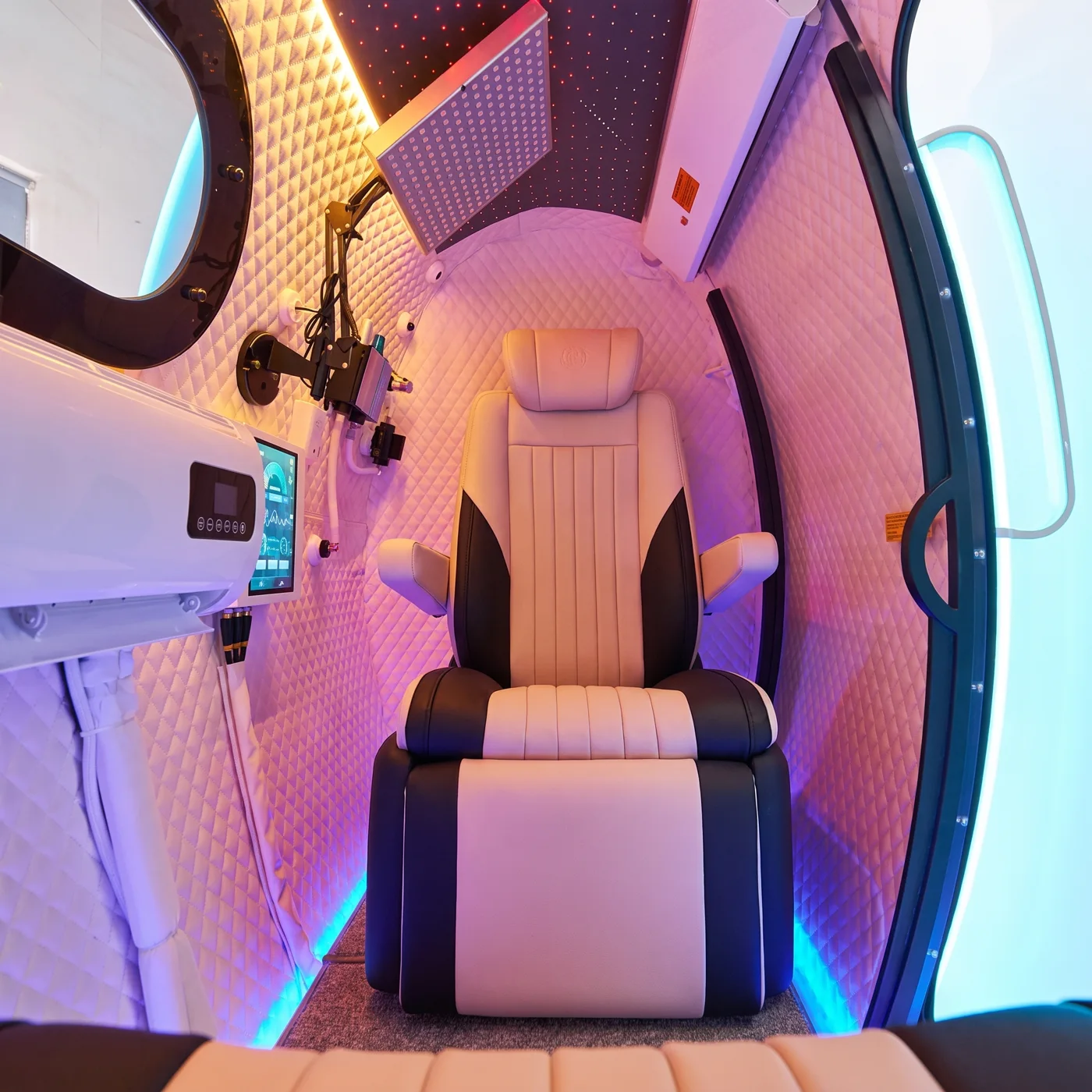 Inside the Solaris cabin: the seat, the quilted leather walls, the touchscreen and the starlit ceiling
