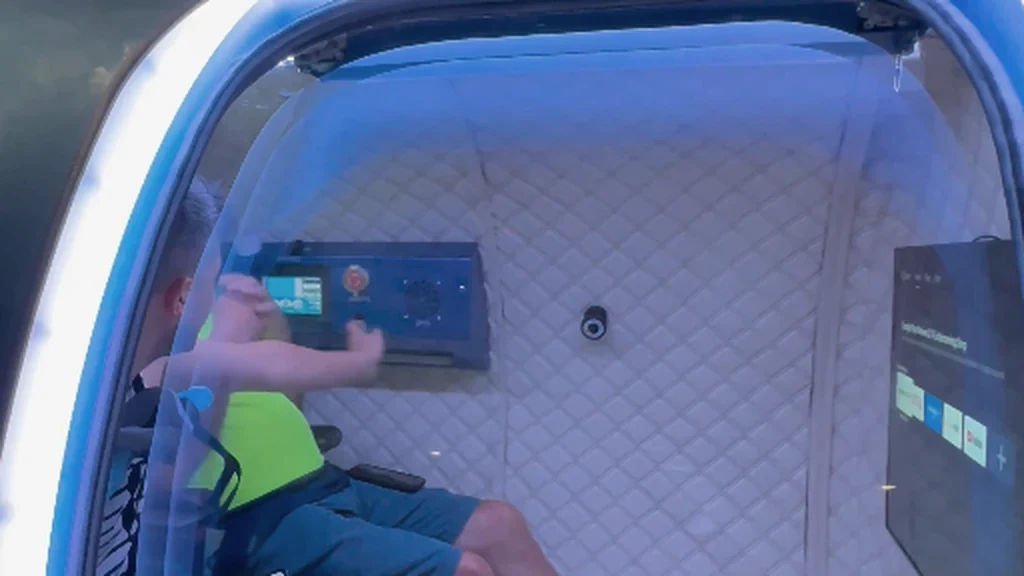 Being shown the in-cabin controls during handover
